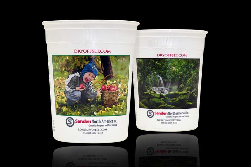 Plastic cups with nature and child images.