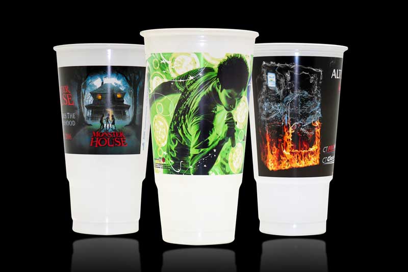 Three cups with colorful themed designs.